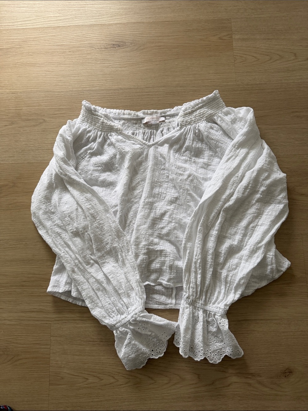 Olivaceous White Peasant Blouse with Eyelet Cuffs